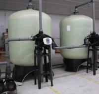 Système central de chauffage et de climatisation utilisant un grand système d'adoucissement de l'eau