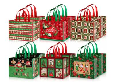 O presente reusável de compra não tecido ensaca o Natal não tóxico com punhos