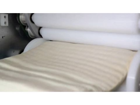 Automated Round Raisin Swirl Bread Production Line: Lamination, Servo Cutting & Precision Tray Panning
