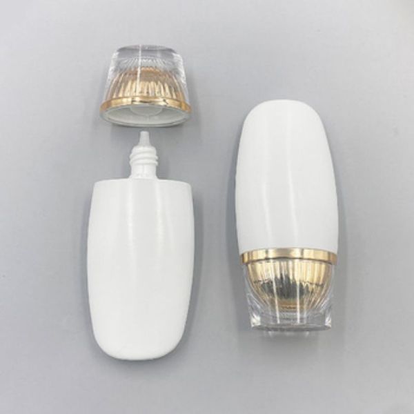 50ml Oval Shaped Luxury Gold Sunscreen Bottle - High-End Cosmetic Plastic Bottle for Skincare