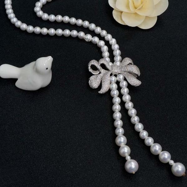 Women White 8mm Shell Pearl Starnds Tassel Necklace with Cubic Zirconia Bow Charm (SN702141)