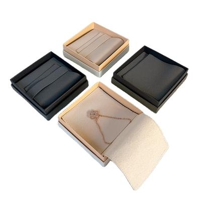 Saco de jóias Conjunto personalizado Logotipo Envelope Flap Design de corda elástica de feltro arco de camurça Bolsas