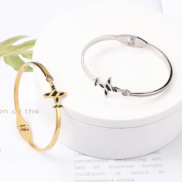 Stainless Steel aircraft bracelet 18k gold titanium spring drip oil Creative gift accessories wholesale yiwu