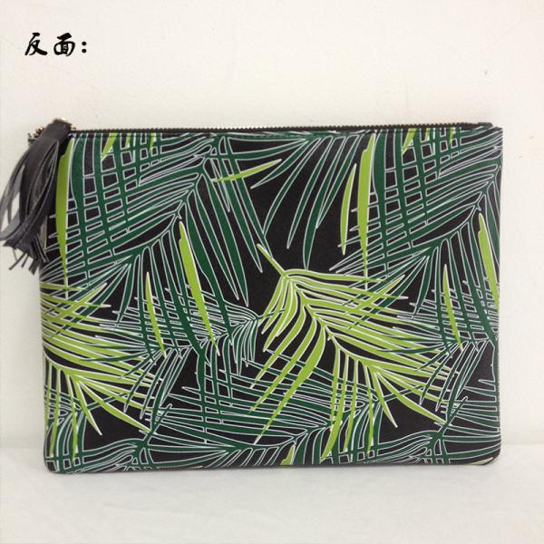 2016 summer new women's European and American high-grade PU tassel pendant wild portable Clutch