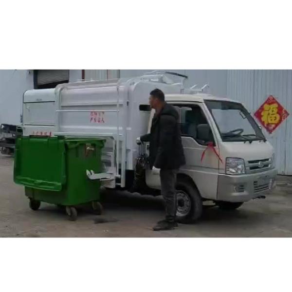 Motorized four-wheeled three-wheeled garbage truck