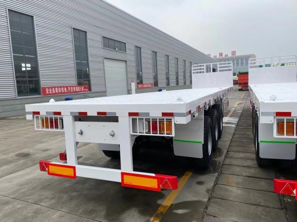 3 Axles 20-45FT 60t 70t 80t Container Flatbed Semi Trailers with Jost E100 Landing Gear