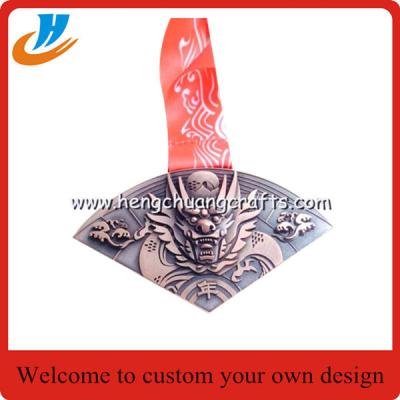 Relief metal medal with raised wolf head, personalized embossed metal medals,