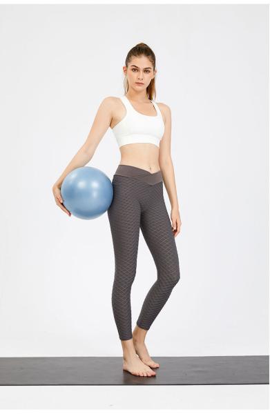 A ioga veste o Spandex 50% que de 50% as senhoras misturadas de nylon malham calças e partes superiores aptas