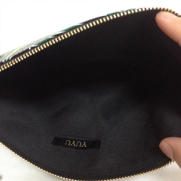 2016 summer new women's European and American high-grade PU tassel pendant wild portable Clutch