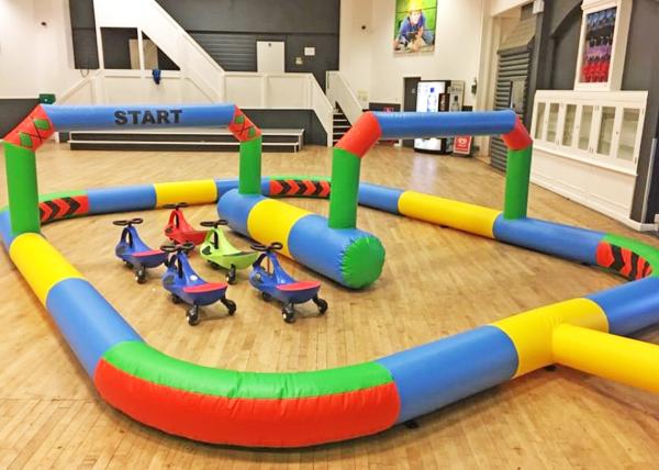 Funny Inflatable Sports Games Bicycle Racing Theme Customized Size For Children