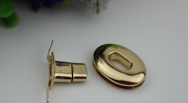 High quality small oval shape metal handbag accessories gold twist turn lock