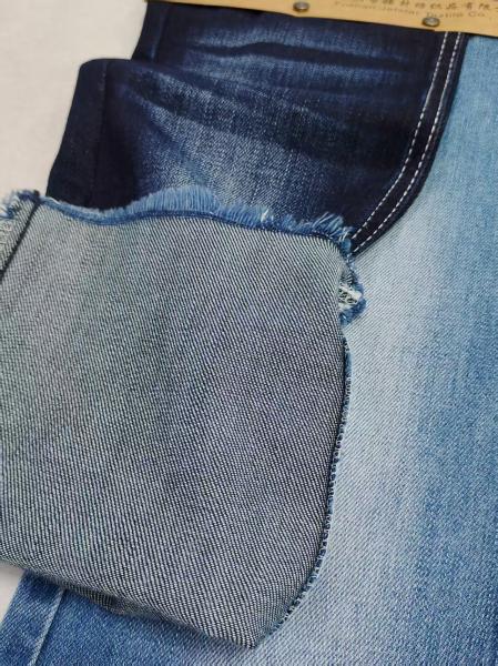 Siro Yarn Cross Slub Estiramiento débil 85% algodón Tejido denim 8+8*10/40+70 construcción JSD3300 Para pantalones vaqueros o chaqueta