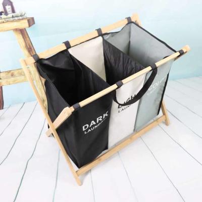 Peso leve lavável do quadro de bambu Moistureproof respirável do cabaz da lavanderia de 3 escaninhos