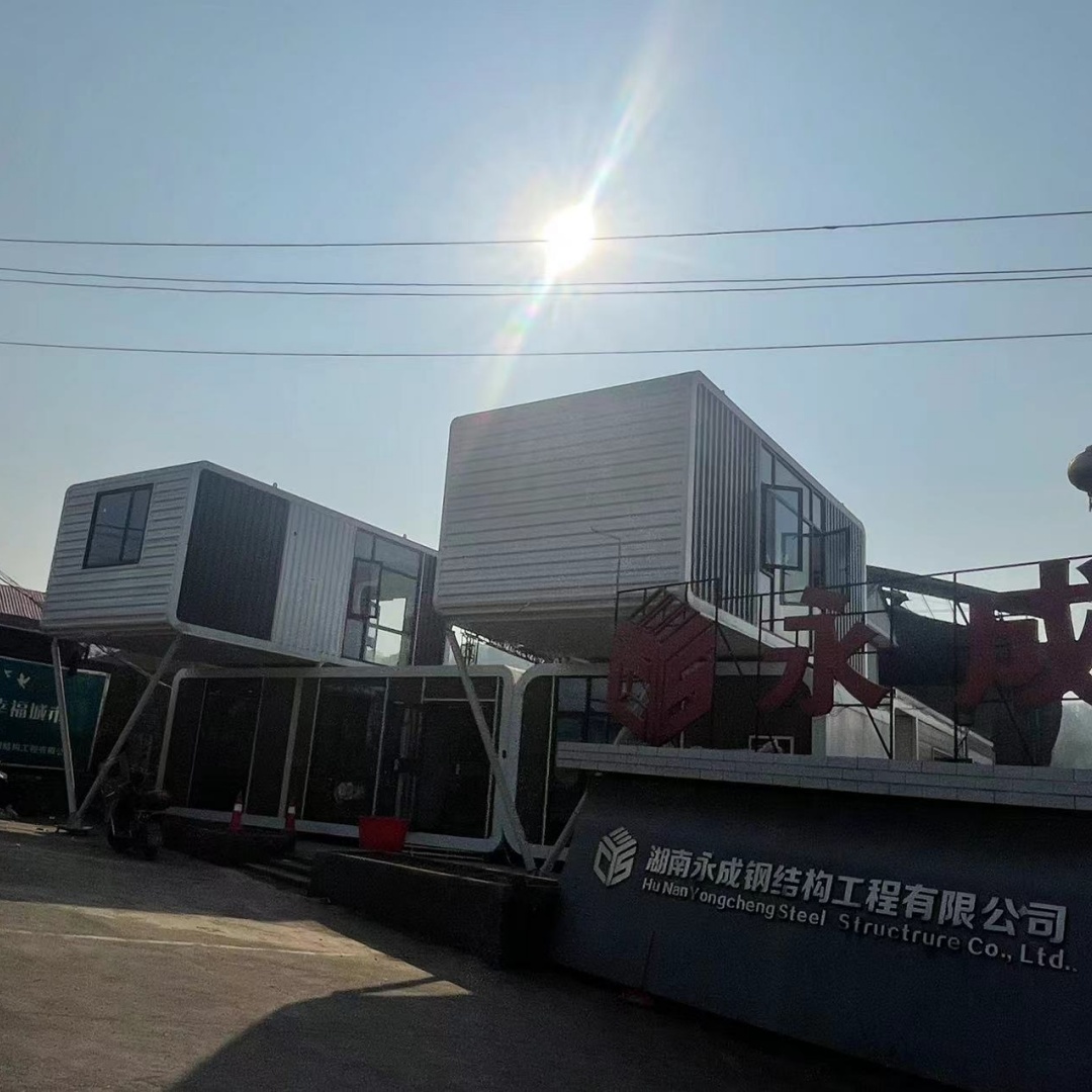 Easy Flat-Pack Assembly Prefab Tiny Cabin Steel Structure Sandwich Panel Greenhouse with Bird Apple Container House Growth Cabin
