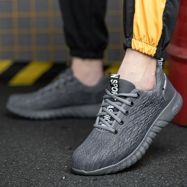 Des chaussures de travail pour hommes, des chaussures respirantes pour le travail de sécurité.