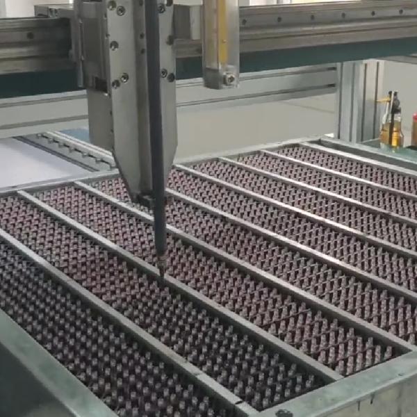 Machine d'encapsulation à colle avec support de maintenance à distance, précision de dosage de ±1% et temps de cycle 40% plus rapides