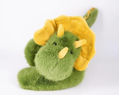Un coussin de dinosaure confortable et haut de gamme