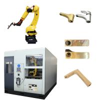 Système automatique de polissage, meulage et ébavurage pour carters de moteur