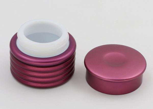 Os frascos cosméticos de vidro roxos, os recipientes de creme de vidro para desnatam e loções