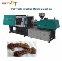 Les dents de chien s'inquiètent mâchant la machine de moulage par injection de festins pour des jouets et des festins de chien
