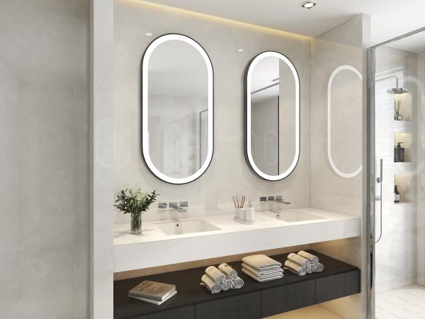 Un miroir de salle de bains en aluminium en or éclairé à LED pour un hôtel moderne
