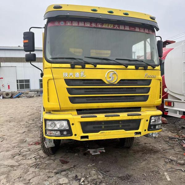 2009 Used HOWO 10 Tires Cabin 2 Axles 20 CBM 371HP Air-Condition Dump Truck with ABS
