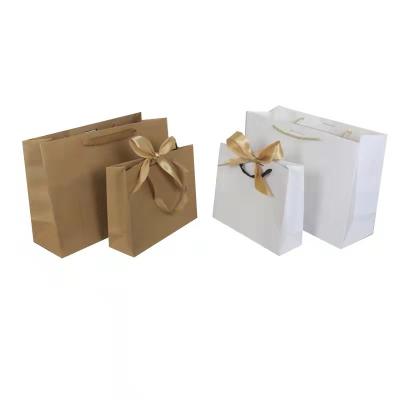 Bolsas de papel impresso reutilizáveis em papel branco Kraft Bolsas de presente
