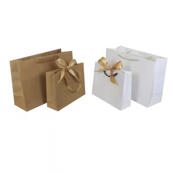 Bolsa de papel de luxo de compra de presente de papel impresso customizado bolsa de papel kraft marrom com o seu próprio logotipo para roupas joias