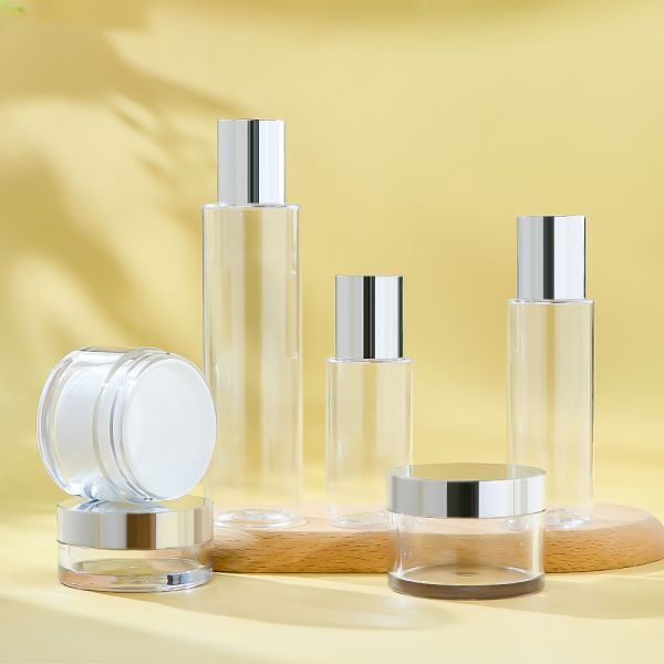 Refillable Cream Jar and Toner Bottle Set with Electroplated Silver Cap and Premium Transparency for Skincare Packaging
