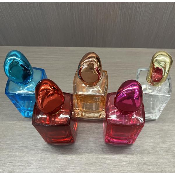 Botella de perfume azul de fondo cuadrado de alta gama con caja personalizada de vidrio transparente de 30 ml de 50 ml