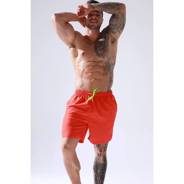 Swimwear людей сплошного цвета замыкает накоротко водоустойчивую носку пляжа шортов заплыва для людей