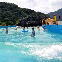 Safe And Thrilling Water Park Wave Pool With Lifeguards Emergency Shut Off Buttons