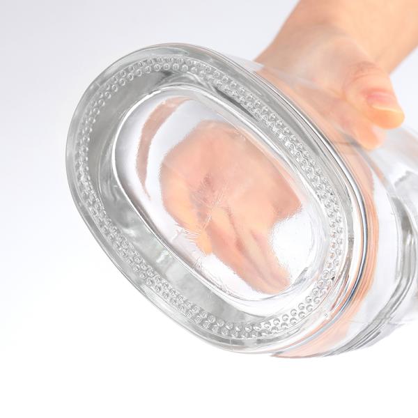 Couleur de la bouteille personnalisée 500 ml 750 ml Bouteille en verre de gin avec couvercle pour la distribution de boissons