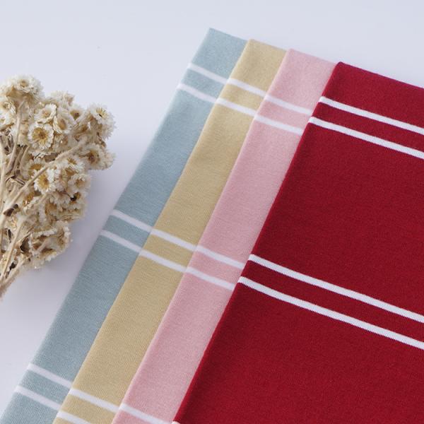 Tejido de material de algodón suave y estriado saludable y amigable para la piel para camiseta