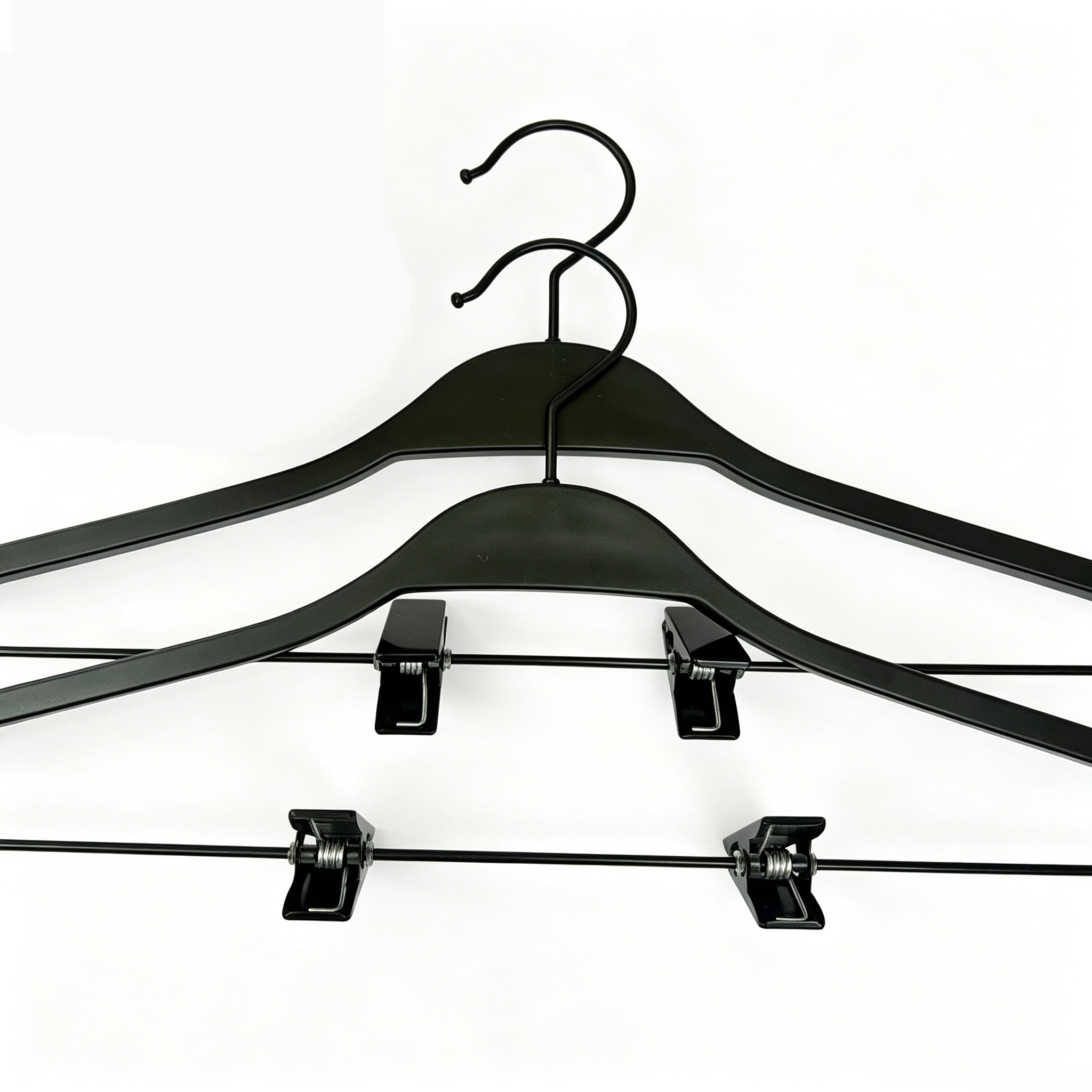 Non-slip non-marking plastic clothes hanger with clips that does not blister for clothing stores