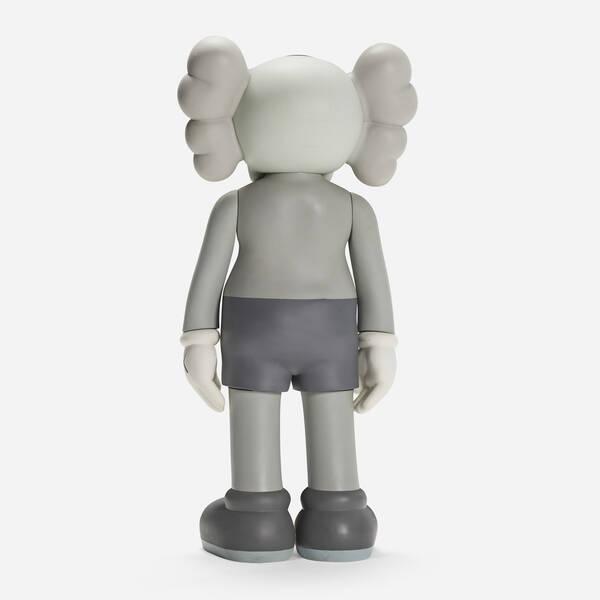 Statement Art Piece: Large Scale Fiberglass KAWS Sculpture for Collectors