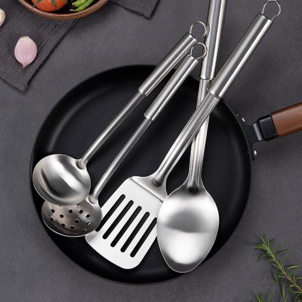 Stainless steel kitchen tool with stainless steel handle