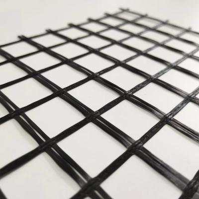 Prevent Cracking Asphalt Driveway  Coated Bitumen  Fiberglass Geogrid 50 50 Grid Mesh 25.4mm