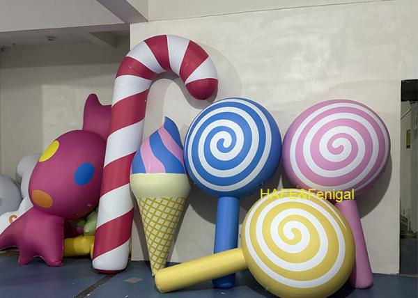 Des ballons de donuts et de bonbons en PVC personnalisés pour l'ouverture des magasins de desserts ou les vitrines
