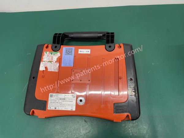 Parte traseira de PRIMEDIC DefiMonitor XD100xe M290 que abriga a tampa com punho