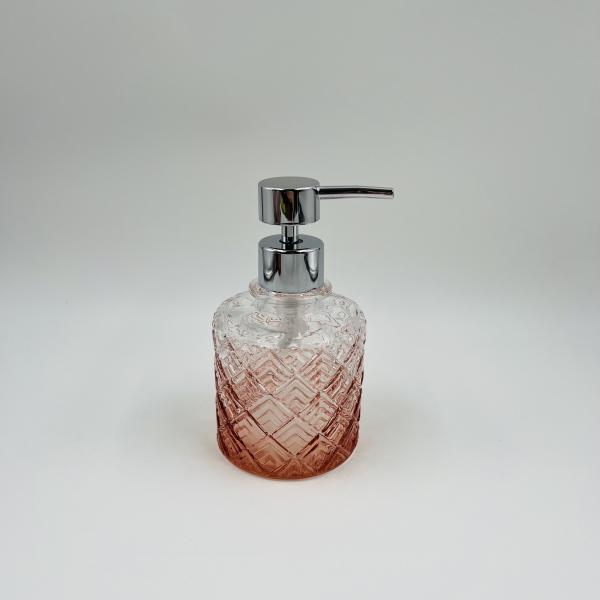 Les accessoires de salle de bains en verre orange de luxe ont une forme ronde avec un motif diamanté