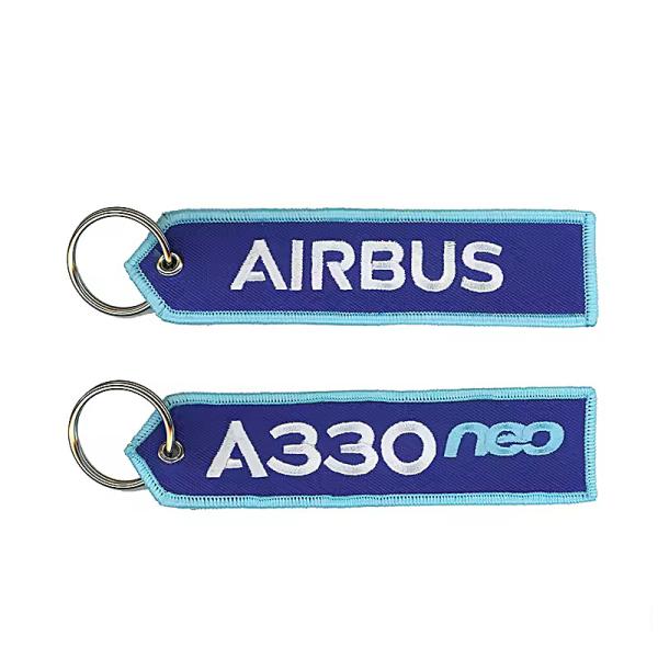 Wholesale Olecranon Hook Cheap Custom Flight Fabric Embroidery Jet Tag Woven Keychain With Your Own Logo