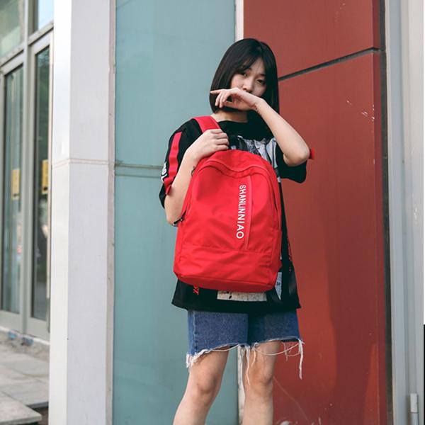 Korean version of pure color high school students backpack campus men and women cool backpack