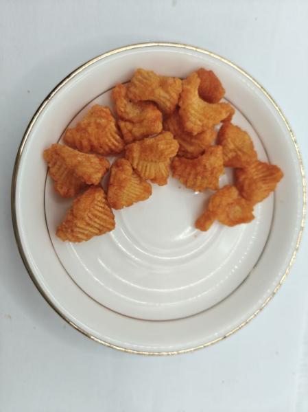風味豊かなおやつ、カリカリ食感の渦巻き米菓、絶妙な味わい