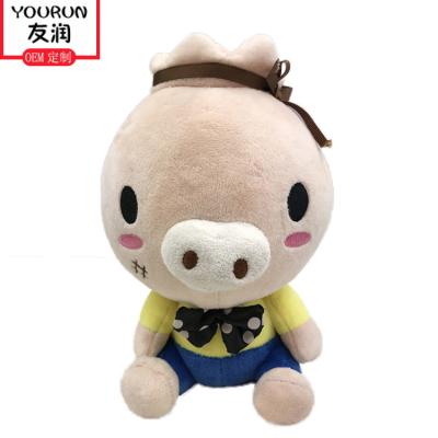 Jouets porcins de peluche