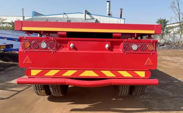 China 3 Axle 20ft 40ft Container Trailer Cargo Flat Bed Flatbed Semi Trailer With Container Lock