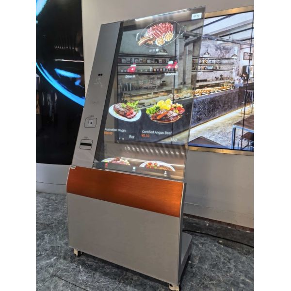 A 55-inch Transparent OLED Interactive Kiosk with 45% light transmittance and integrated touch functionality, supporting card swiping, queuing, and printing.