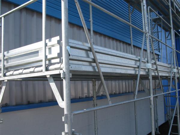 Rolo do metal da indústria que forma o equipamento, pés do bujão que forma máquinas