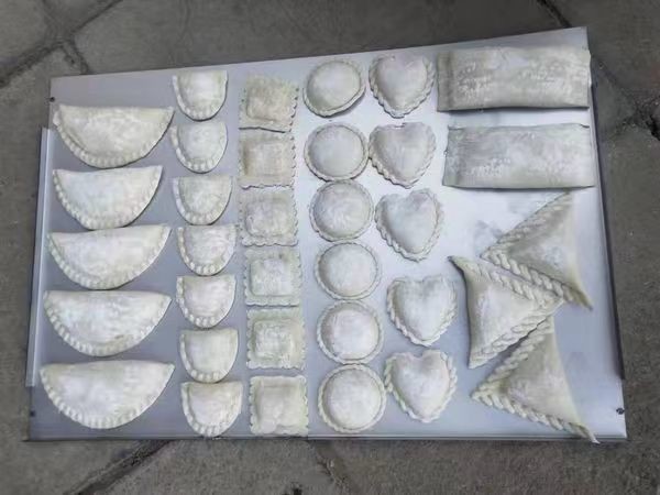 2024 Automatic dumpling machine Food Machinery Food Dumpling Machine is simple,