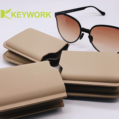 Les lunettes de soleil pliables ultra minces à la mode de caisse de lunettes de soleil gainent le cuir d'unité centrale d'ECO